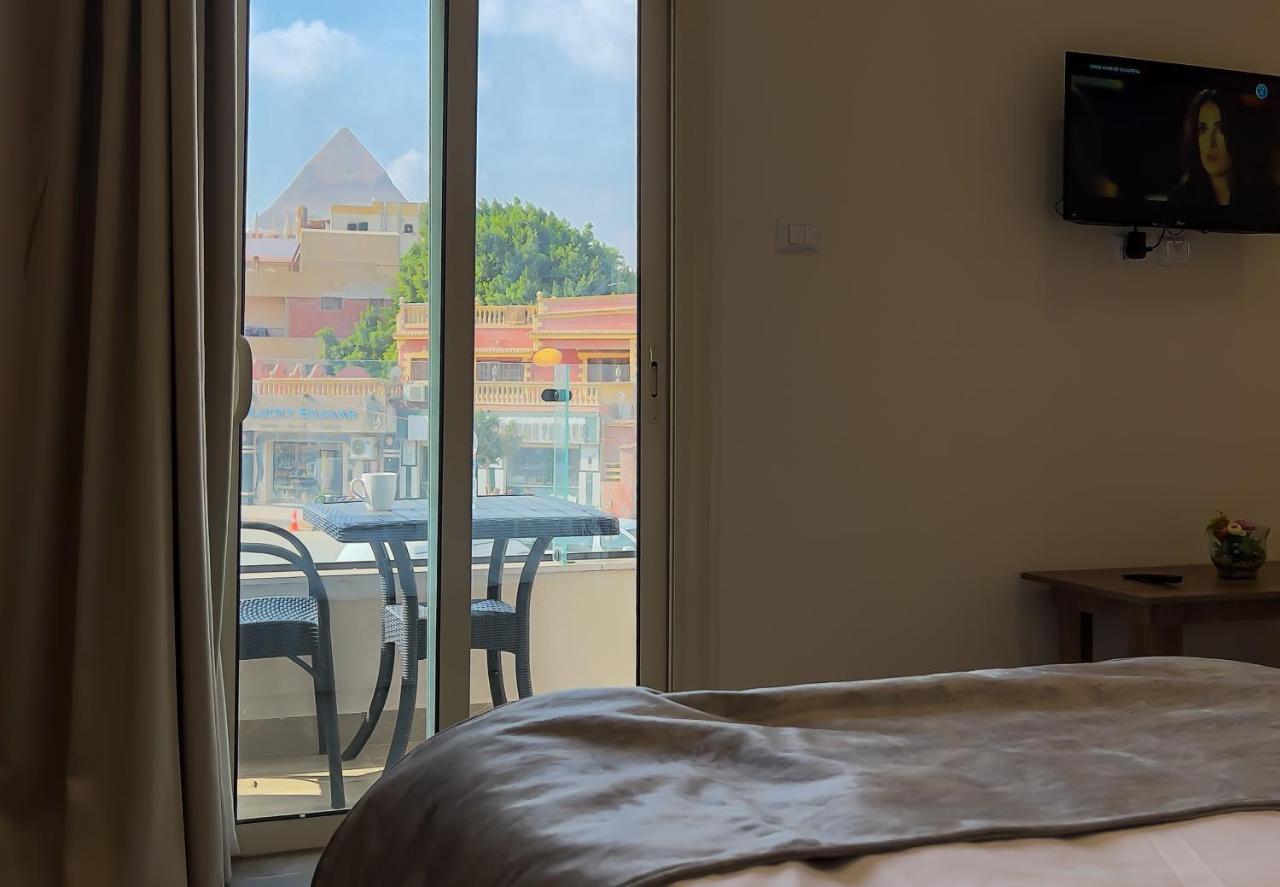 Junior Suite with Balcony and Pyramids View