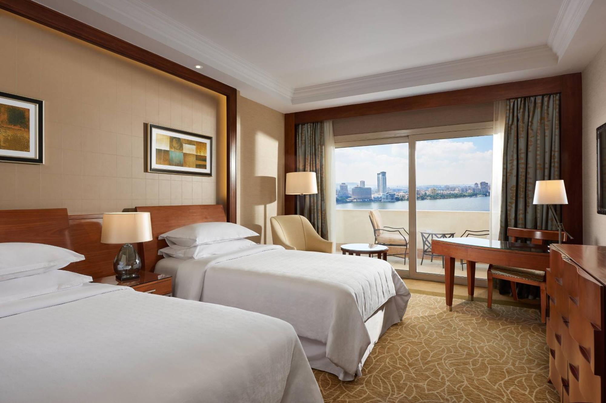 Premium Twin Room with Balcony and Partial River View,1705706379:JPEG