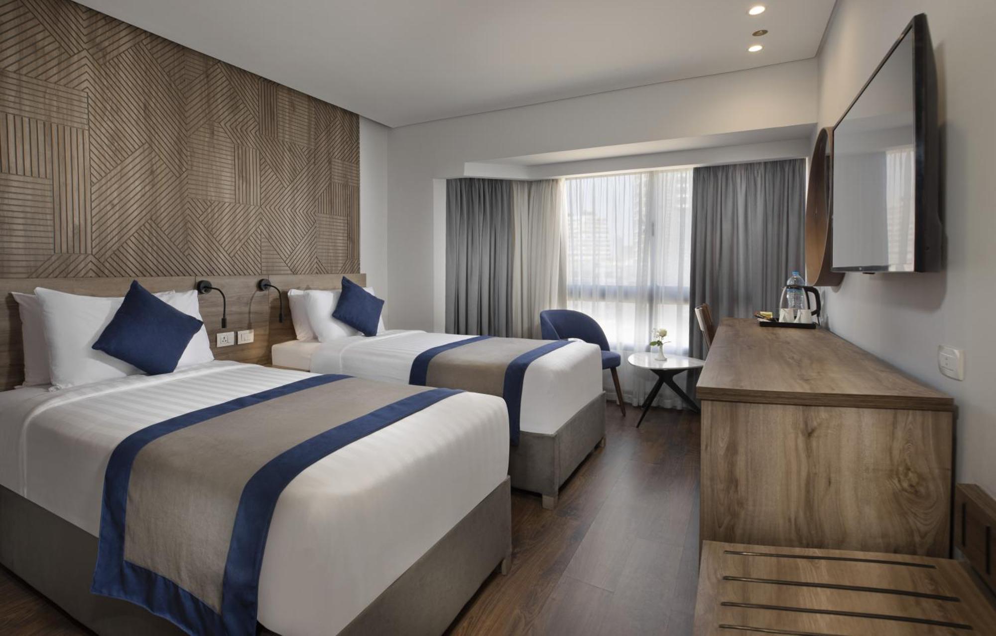 Quarto Deluxe com 2 Camas de Solteiro