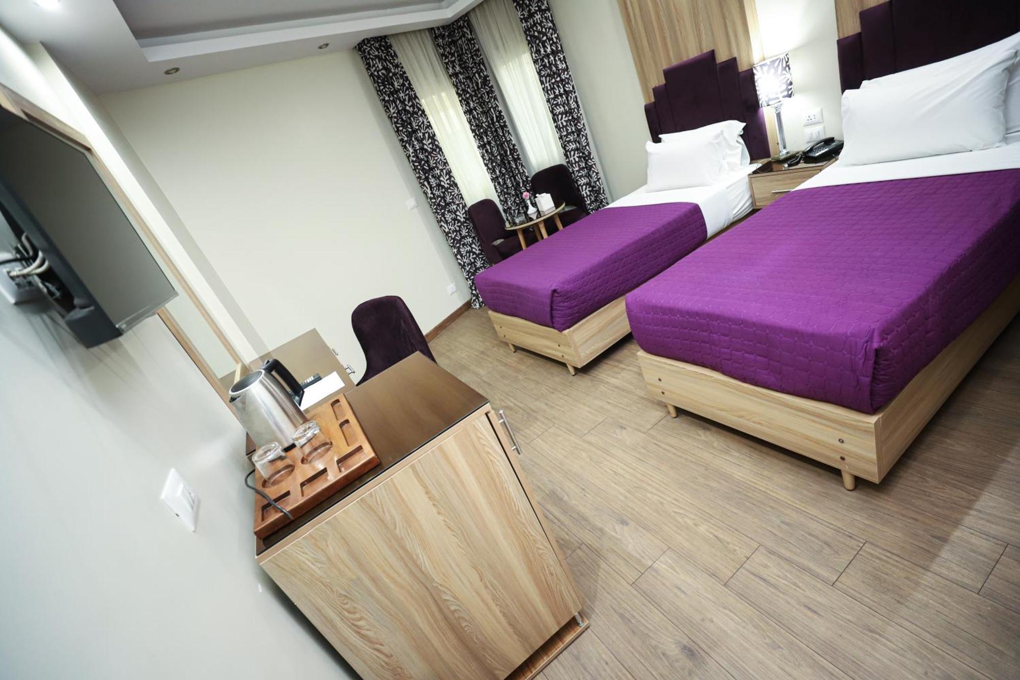 Tweepersoonskamer met 2 Aparte Bedden